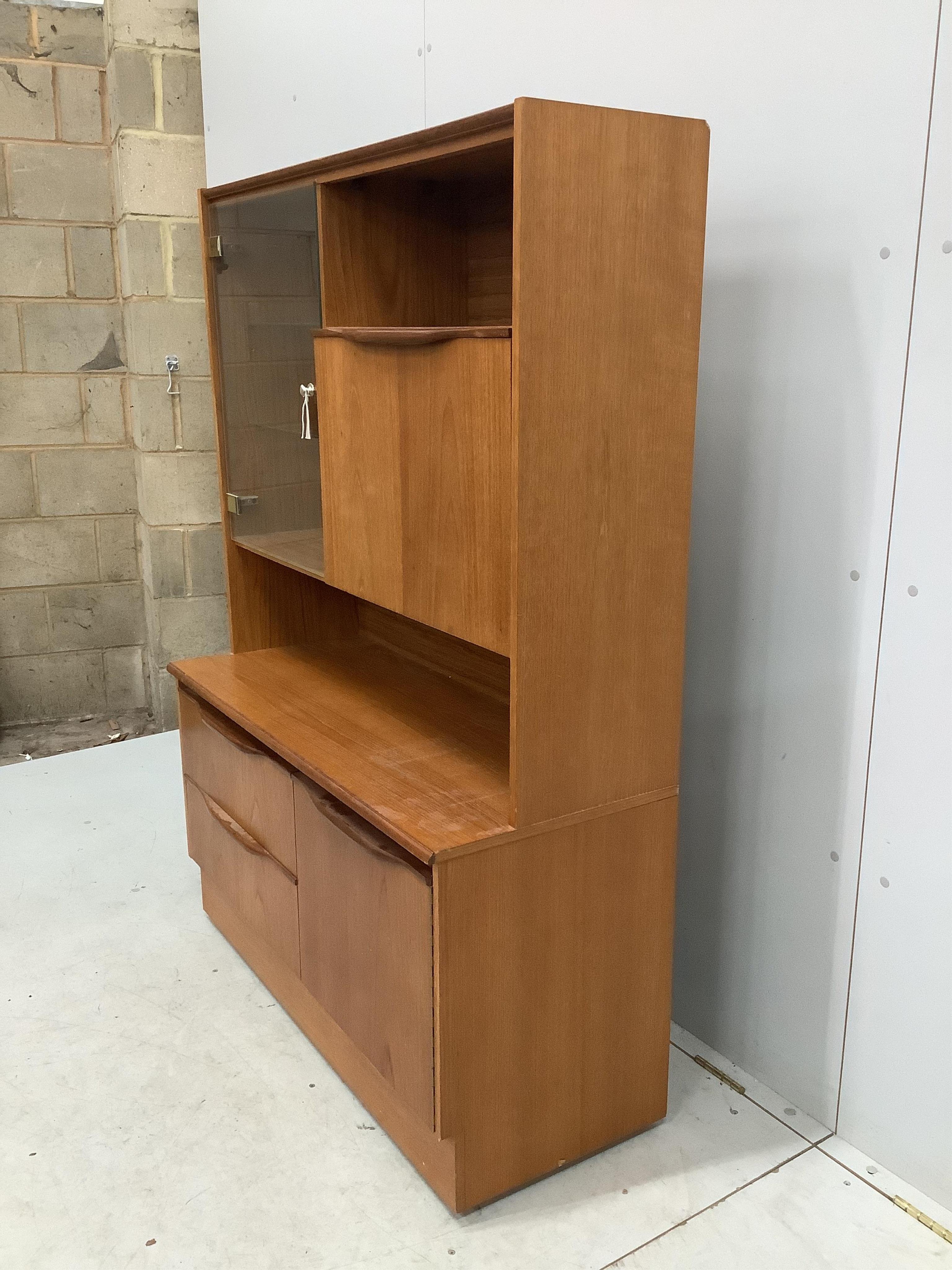 A G plan display unit, width 106cm, depth 43cm, height 149cm. Condition - fair to good